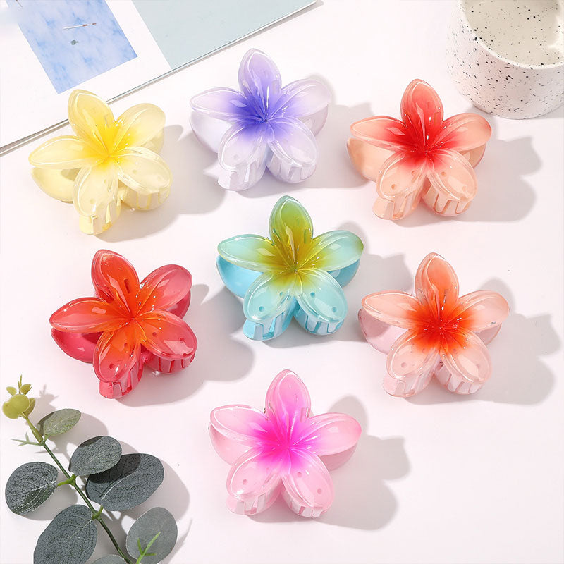 Moderiktig blommahårspänne