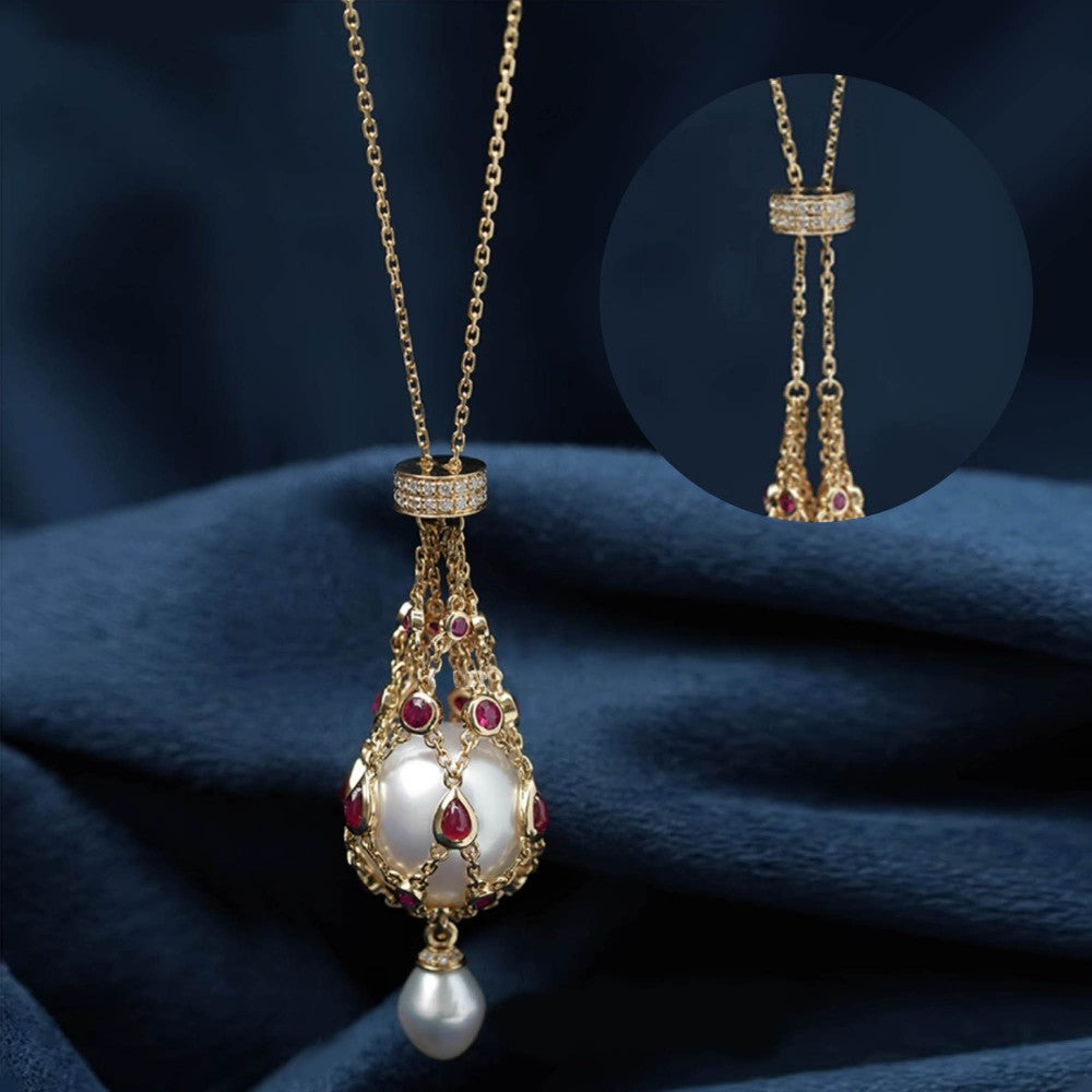 Pendentif lavallière avec perle d'eau douce de 14,0 à 15,0 mm et pierre précieuse bleue.
