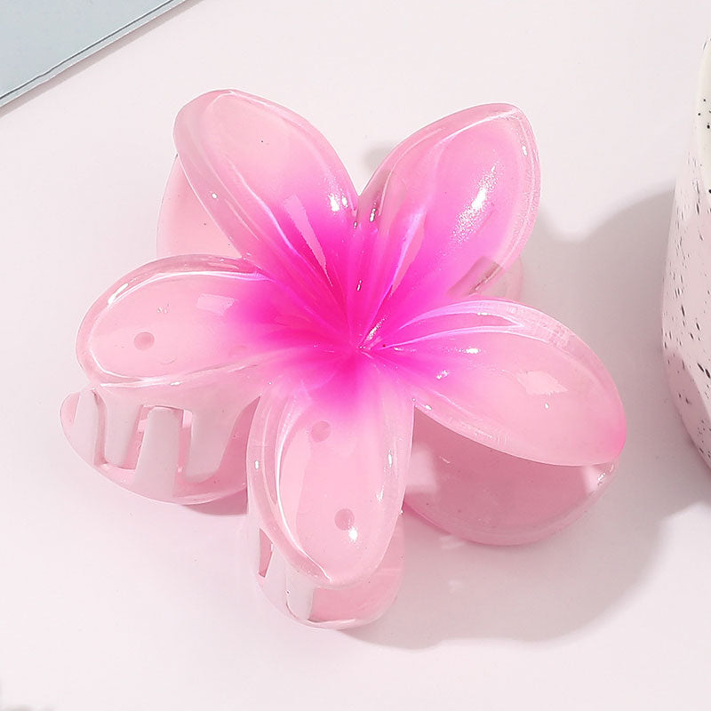 Moderiktig blommahårspänne