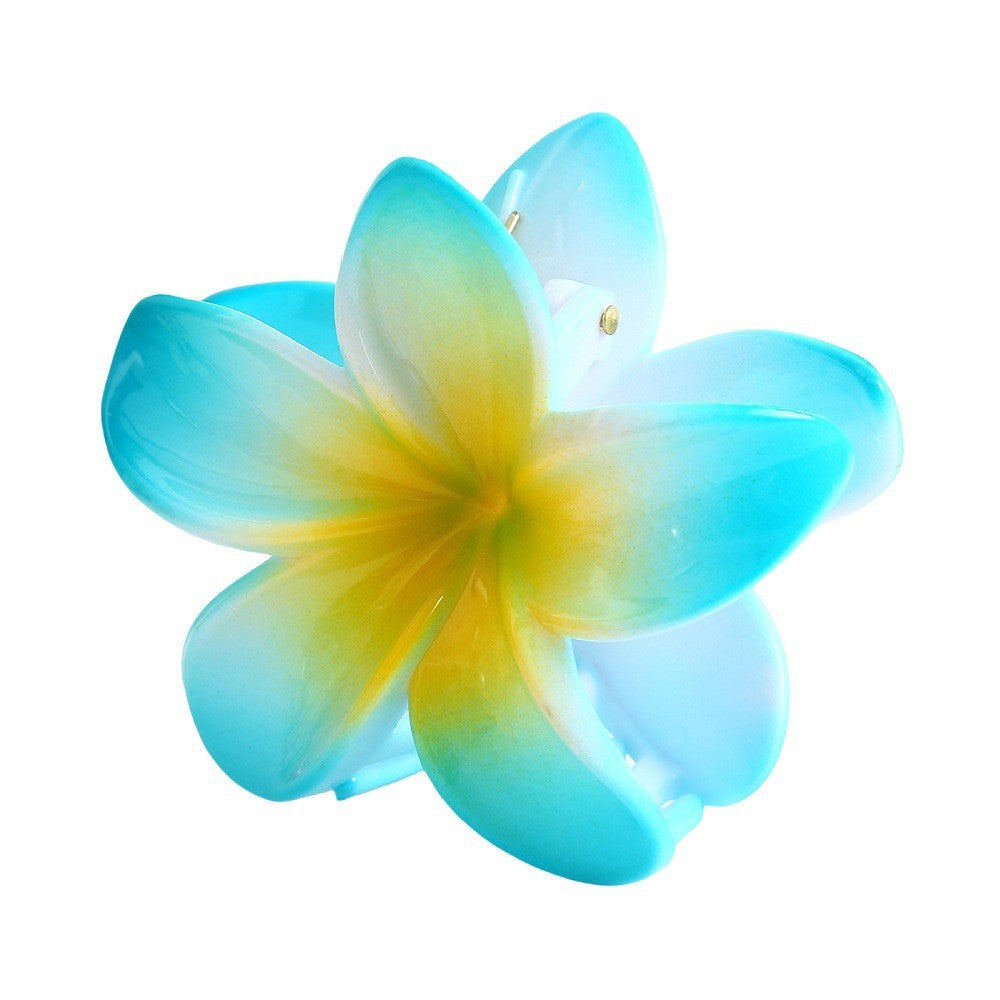 Moderiktig blommahårspänne