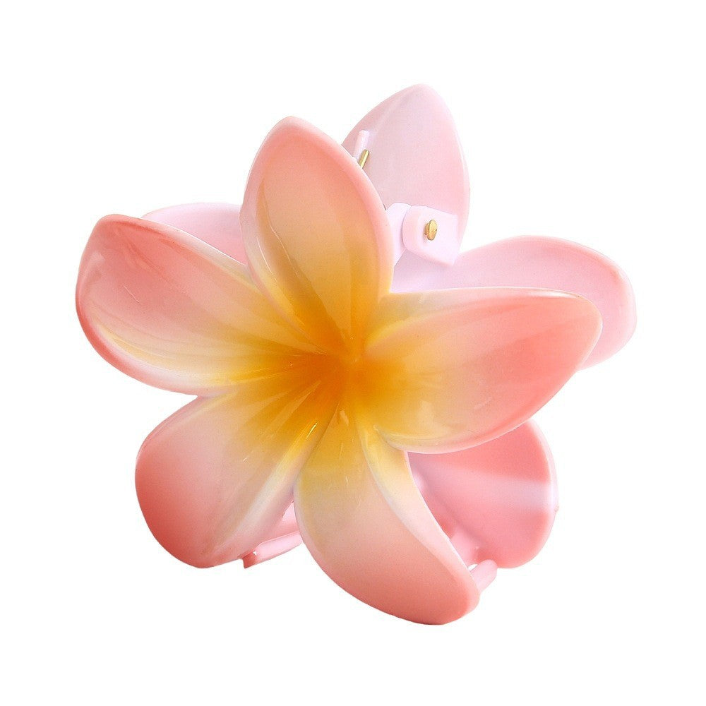 Moderiktig blommahårspänne