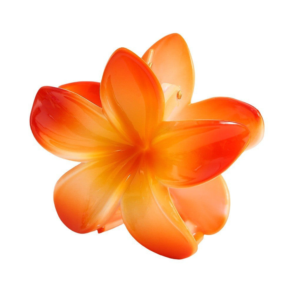 Moderiktig blommahårspänne