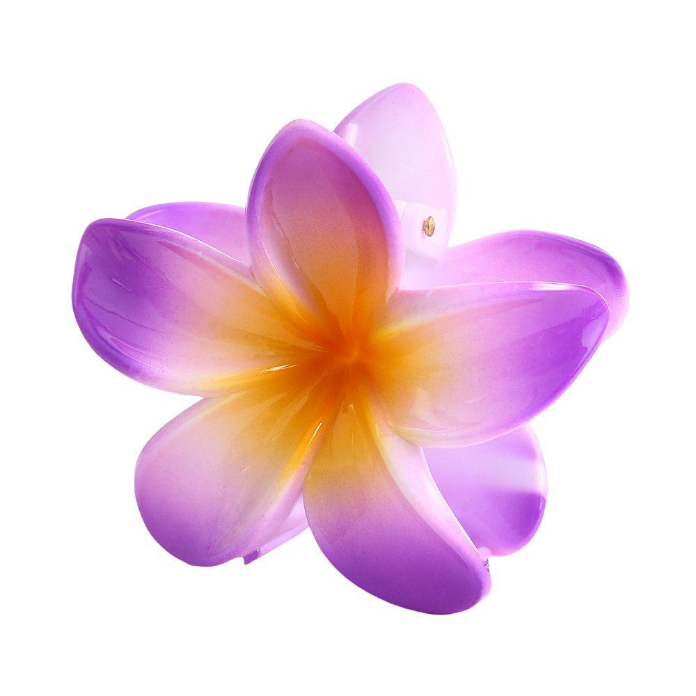 Moderiktig blommahårspänne